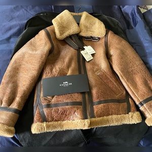 Shearling coach jacket.